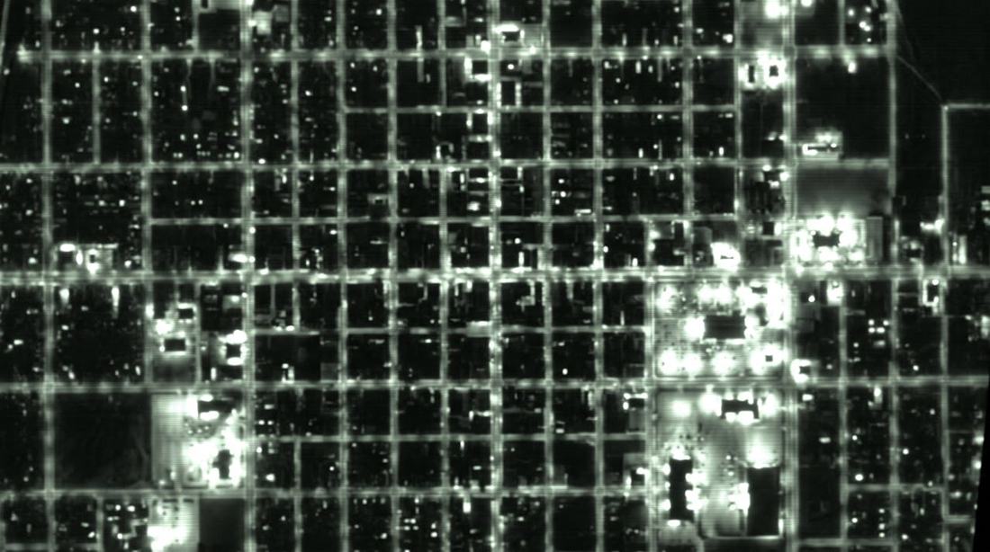 Orbital image of a residential city grid at night